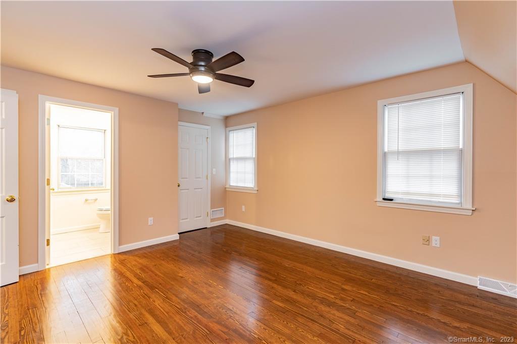 1241 Halladay Avenue West Suffield, CT 06078 - Photo 19 of 29 a view of empty room with wooden floor and fan