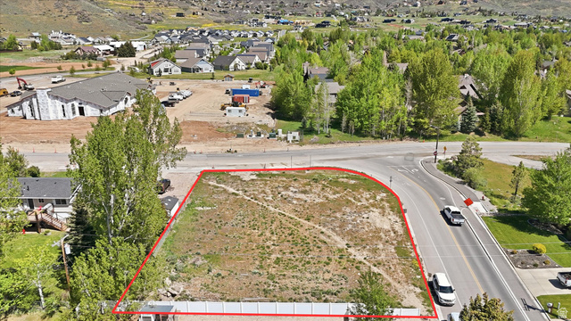 123 West 1050th North, Unit 41 Midway, UT 84049 - Photo 1 of 22 Expansive corner lot with paved road frontage, partially fenced perimeter, and established trees