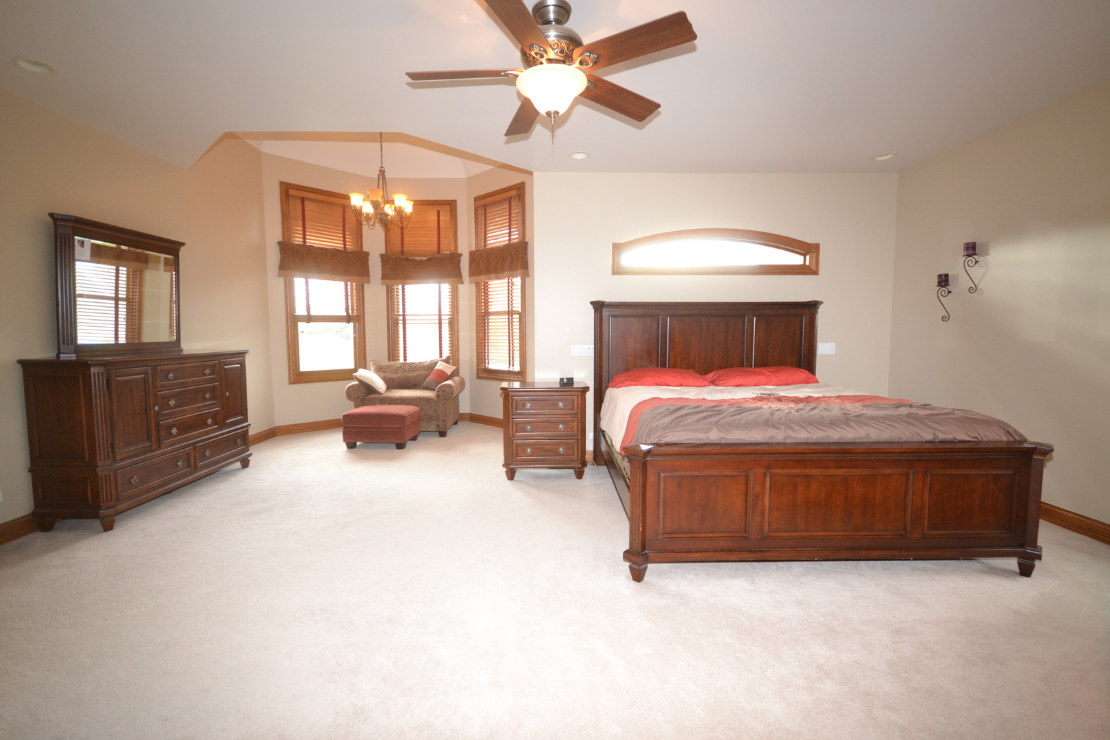 9N313 Muirhead Road Elgin, IL 60124 - Photo 23 of 61 a bed room with a bed and a chandelier fan