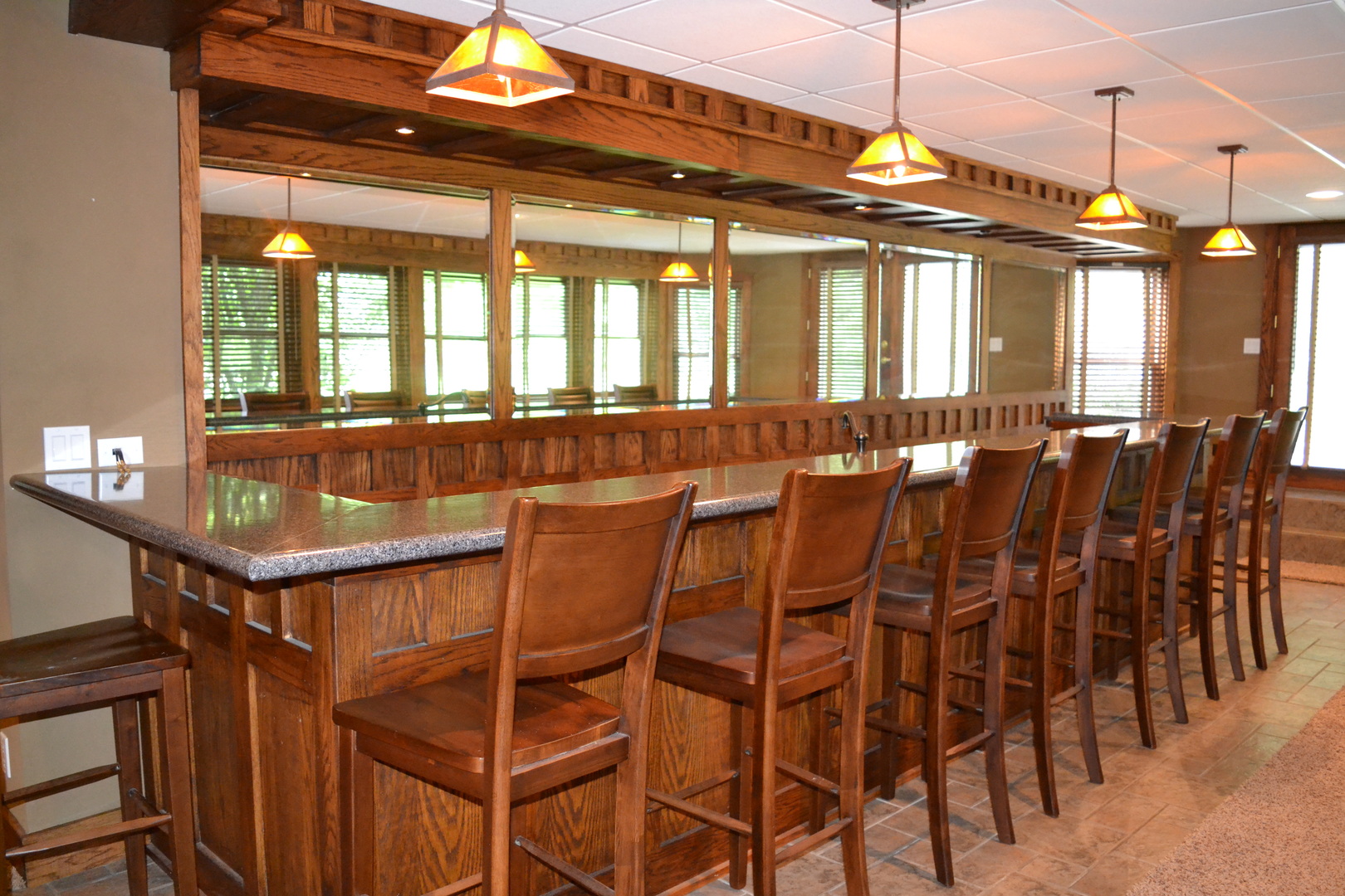 9N313 Muirhead Road Elgin, IL 60124 - Photo 38 of 61 a dining hall with stainless steel appliances a stove a chimney a dining table and chairs with wooden floor