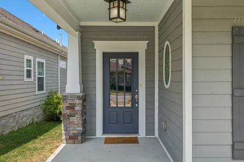 a front view of a house with a garage