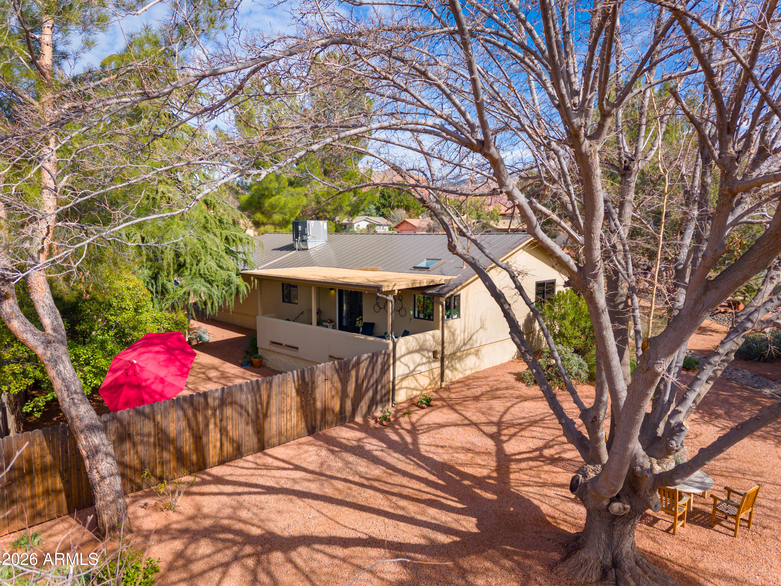 190 Creek Rock Road Sedona, AZ 86351 - Photo 37 of 41 Backyard with covered patio