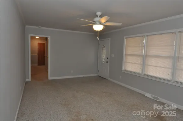 an empty room with window