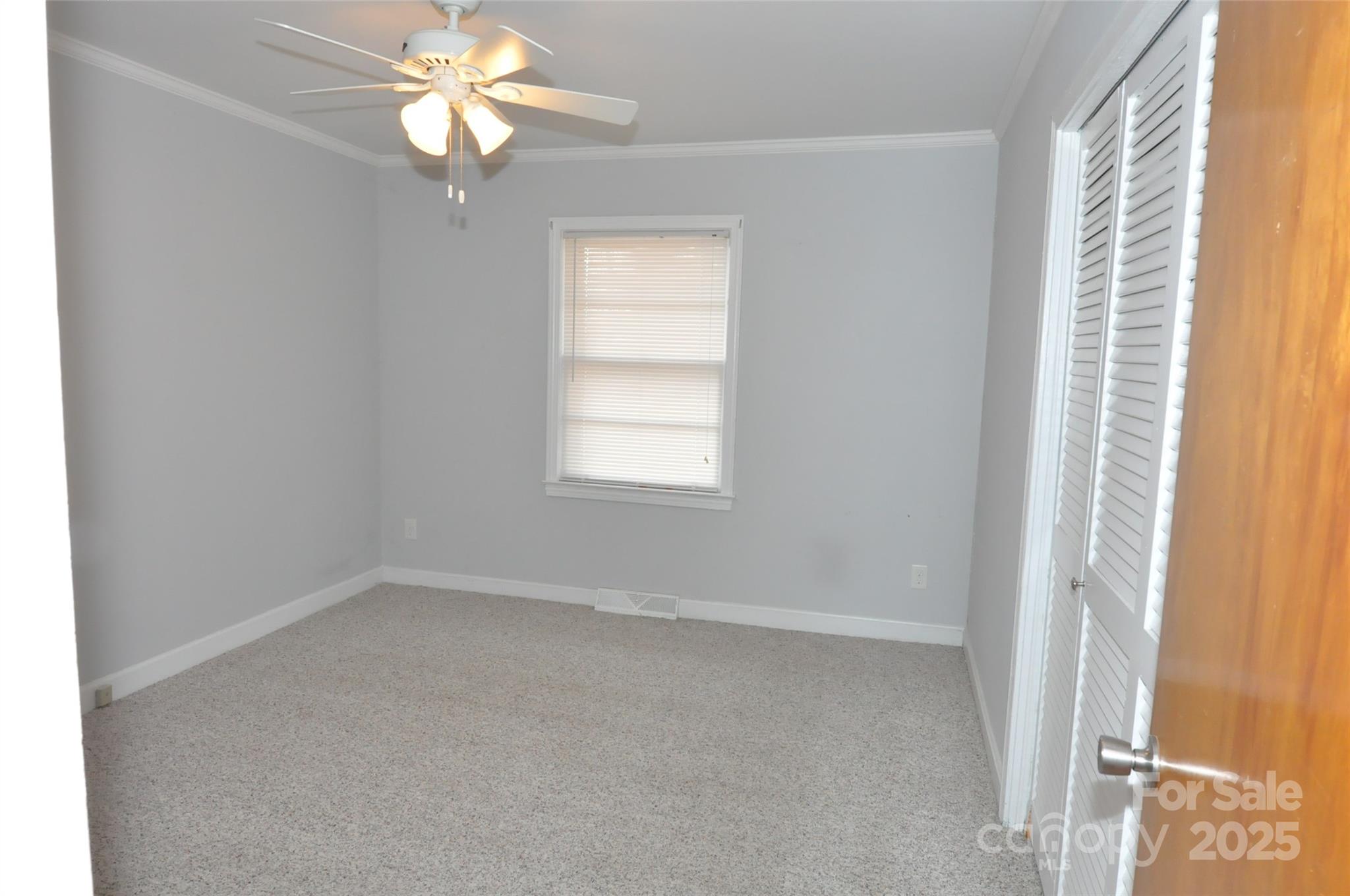378 Center Street, Unit 1 Chester, SC 29706 - Photo 21 of 28 a view of an empty room with a window