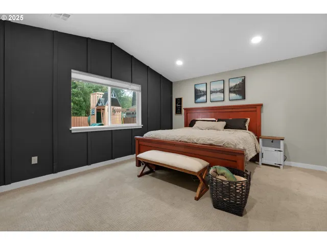 a bedroom with furniture and a window