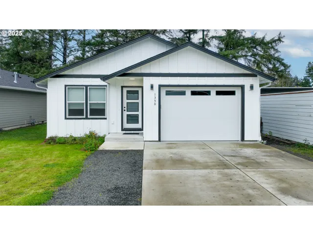 a black and white photo of a house