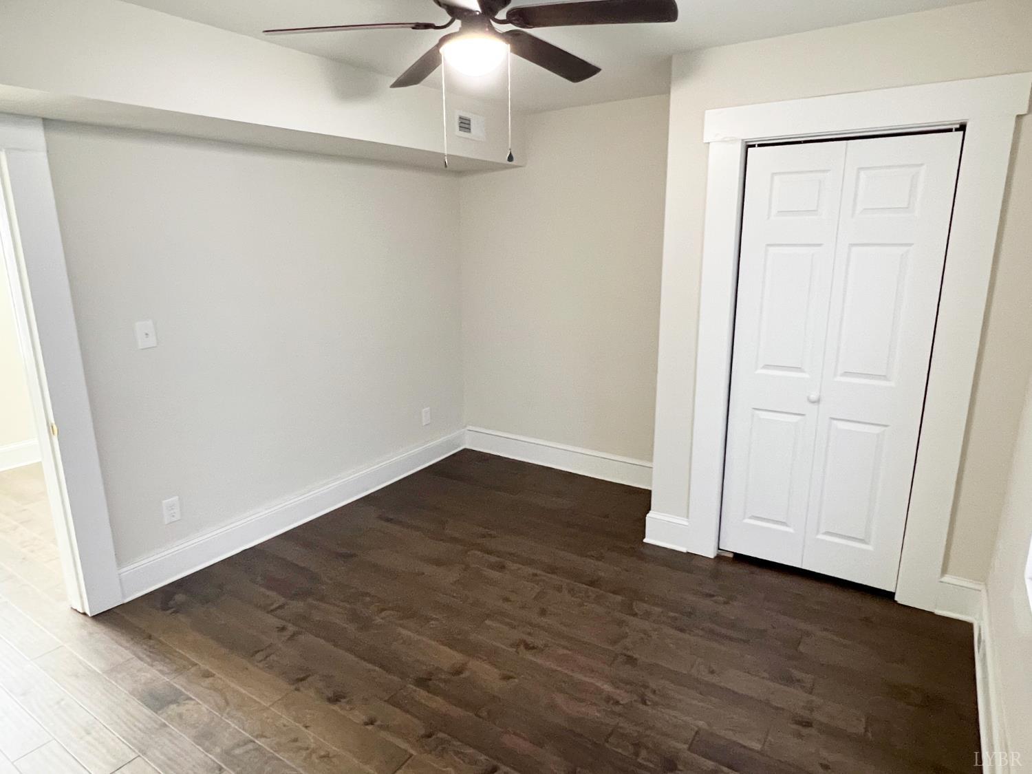 2927 Langhorne Road Lynchburg, VA 24501 - Photo 13 of 19 a view of an empty room with wooden floor