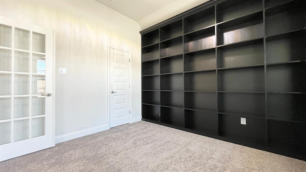 5304 Babcock Road McKinney, TX 75071 - Photo 19 of 27 a bed room with a closet