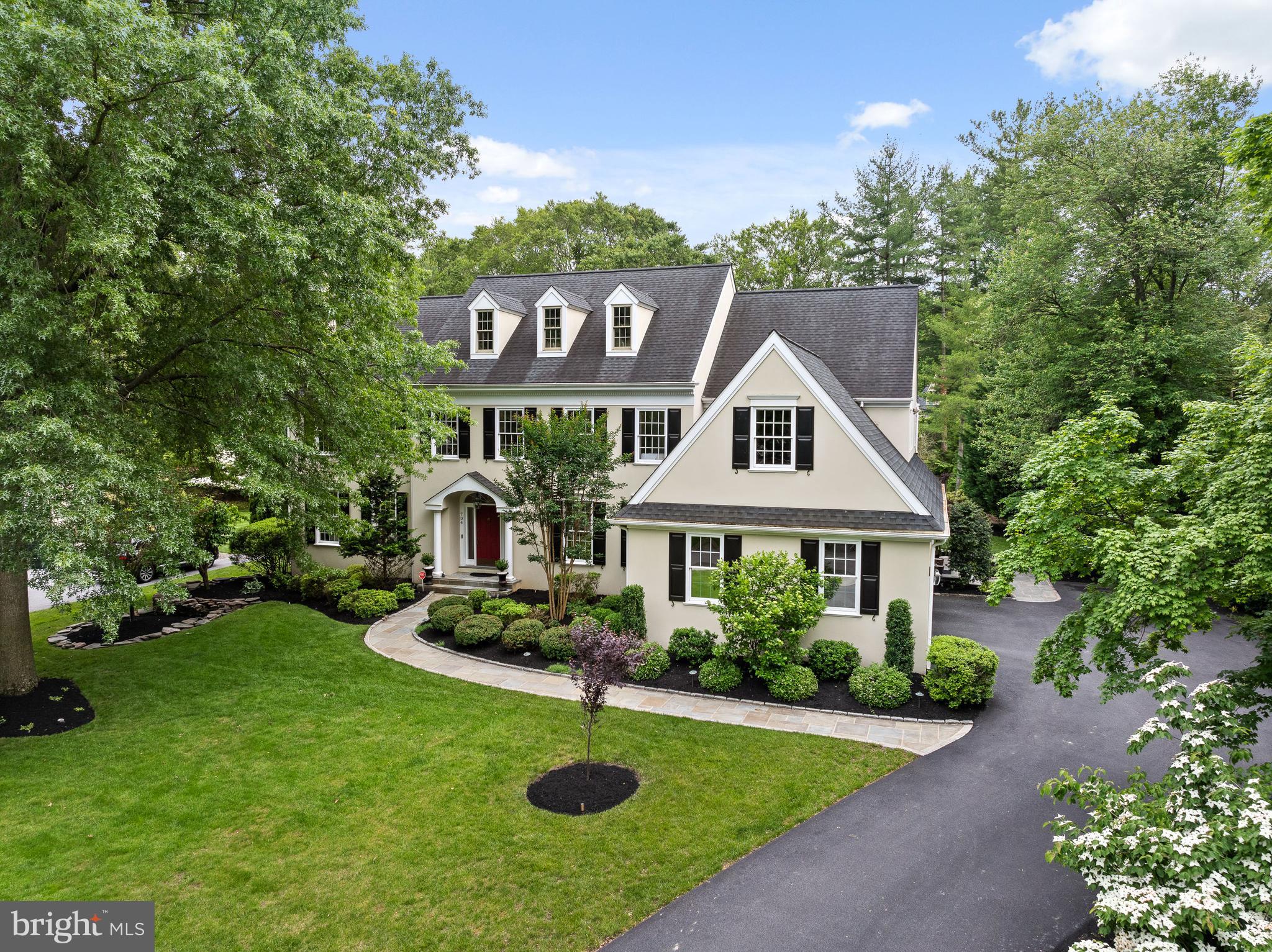 704 Turnbridge Road Wayne, PA 19087 - Photo 1 of 64 a view of a house with garden and trees