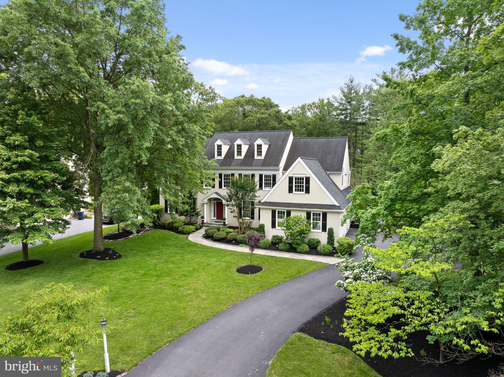 704 Turnbridge Road Wayne, PA 19087 - Photo 2 of 64 a front view of a house with garden