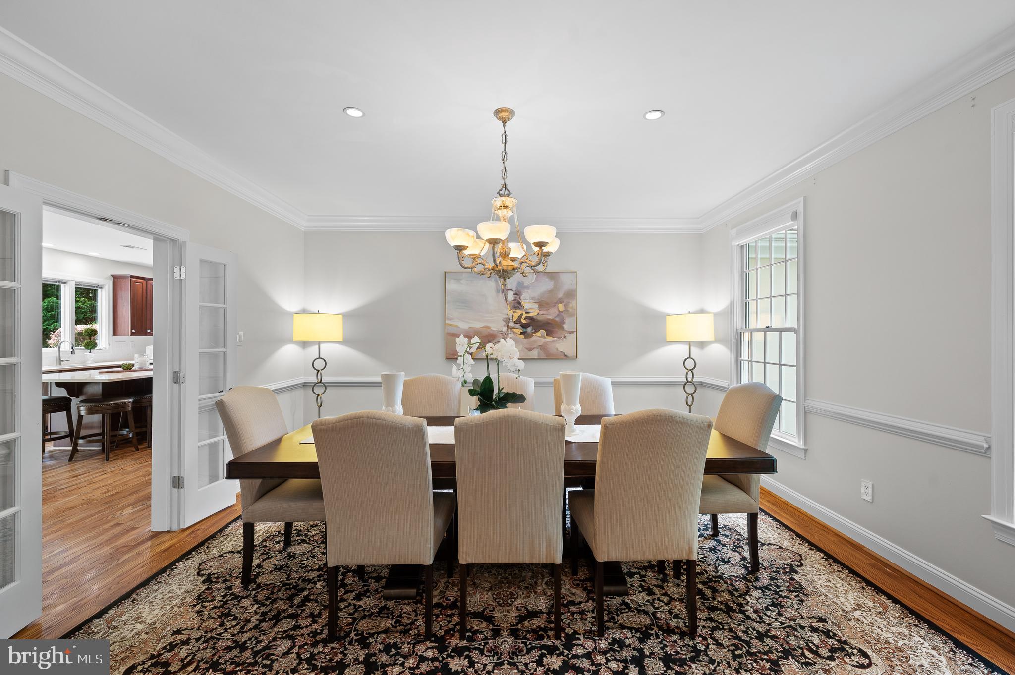 704 Turnbridge Road Wayne, PA 19087 - Photo 8 of 64 a dining room with furniture a chandelier and wooden floor