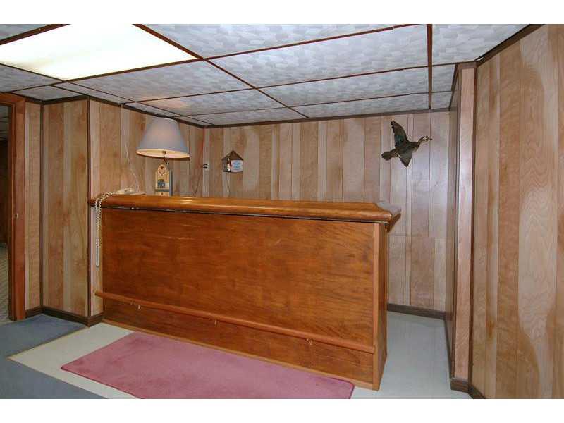 300 Gass Road Pittsburgh, PA 15229 - Photo 16 of 25 Basement/Game Room. The possibilities are endless in the finished Game Room boasting a full bath and walk-behind bar.