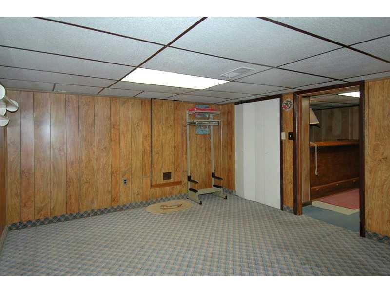 300 Gass Road Pittsburgh, PA 15229 - Photo 18 of 25 Basement/Game Room. Privacy is the key to the Lower Level Den/Bedroom with closet (no window).