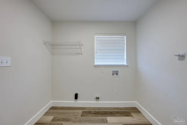 a view of small space with wooden floor