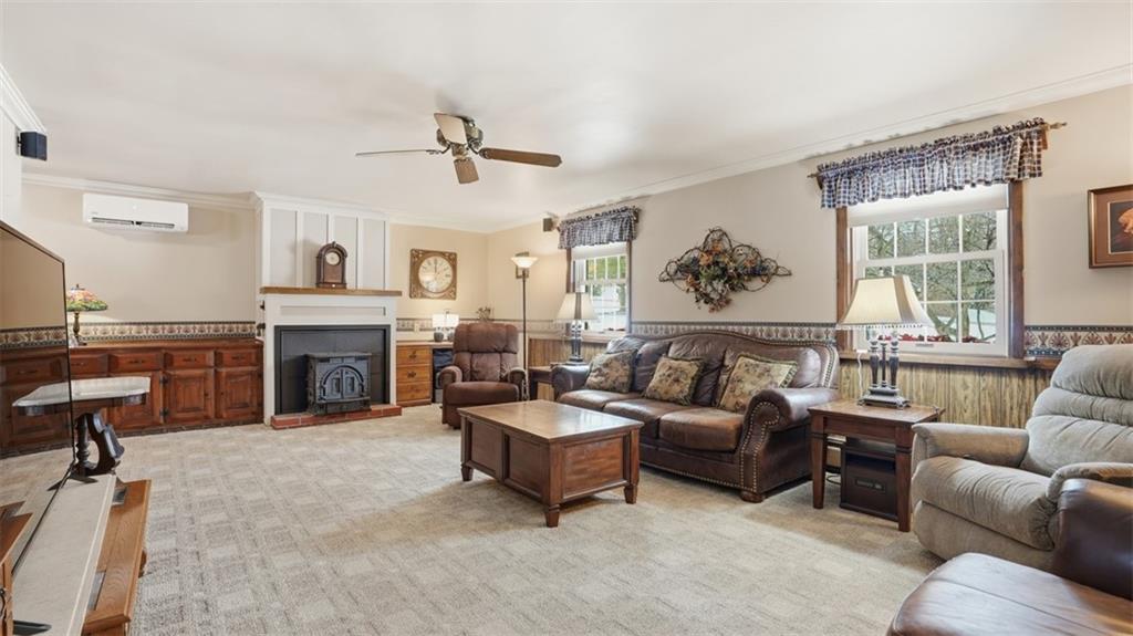 6142 Penn Drive Butler, PA 16002 - Photo 13 of 34 a living room with furniture and a fireplace