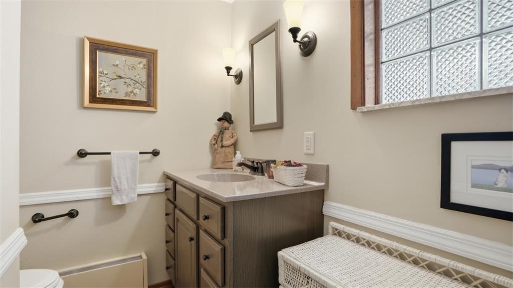 6142 Penn Drive Butler, PA 16002 - Photo 15 of 34 a bathroom with a sink toilet and shower
