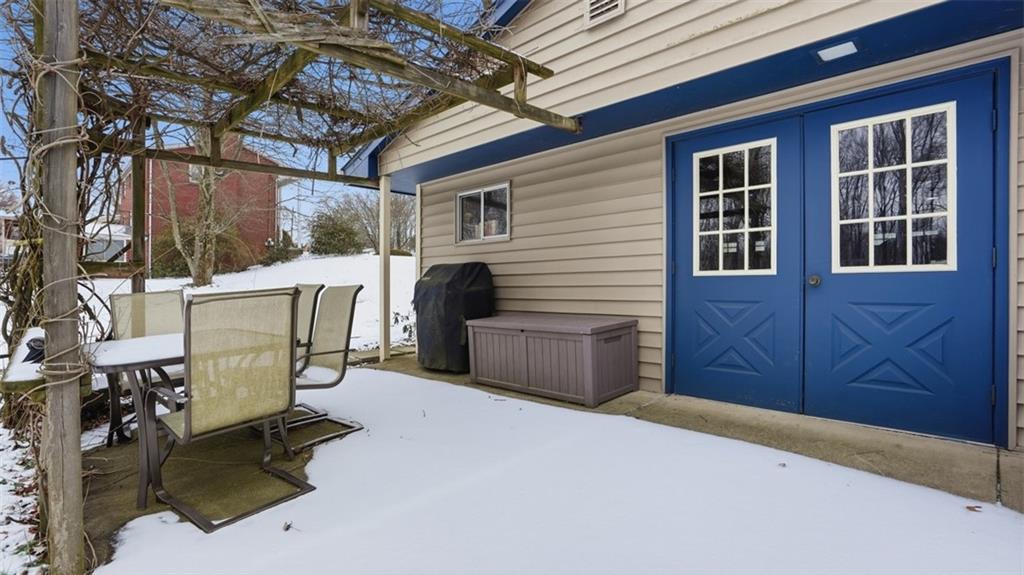6142 Penn Drive Butler, PA 16002 - Photo 26 of 34 a view of a chairs and table in the back yard of the house
