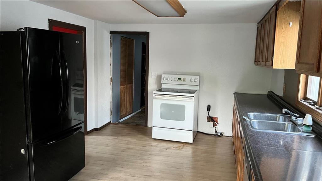 402.5 North 10th Street Apollo, PA 15613 - Photo 4 of 9 a kitchen with a refrigerator stove and sink