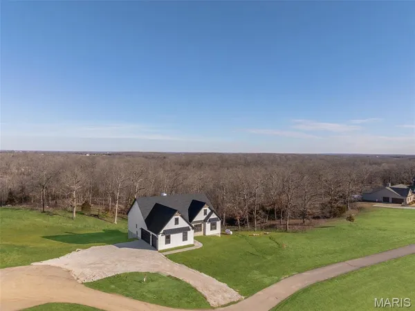$670,000 | 21 Saratoga Spgs Drive, Silex, MO 63377