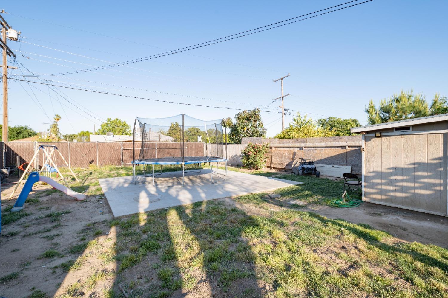 836 North E Street Tulare, CA 93274 - Photo 12 of 13 a view of a backyard