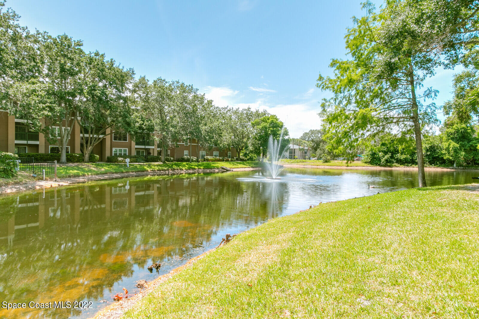 7667 North Wickham Road, Unit 418 Melbourne, FL 32940 - Photo 17 of 36 a view of a lake view with a big yard
