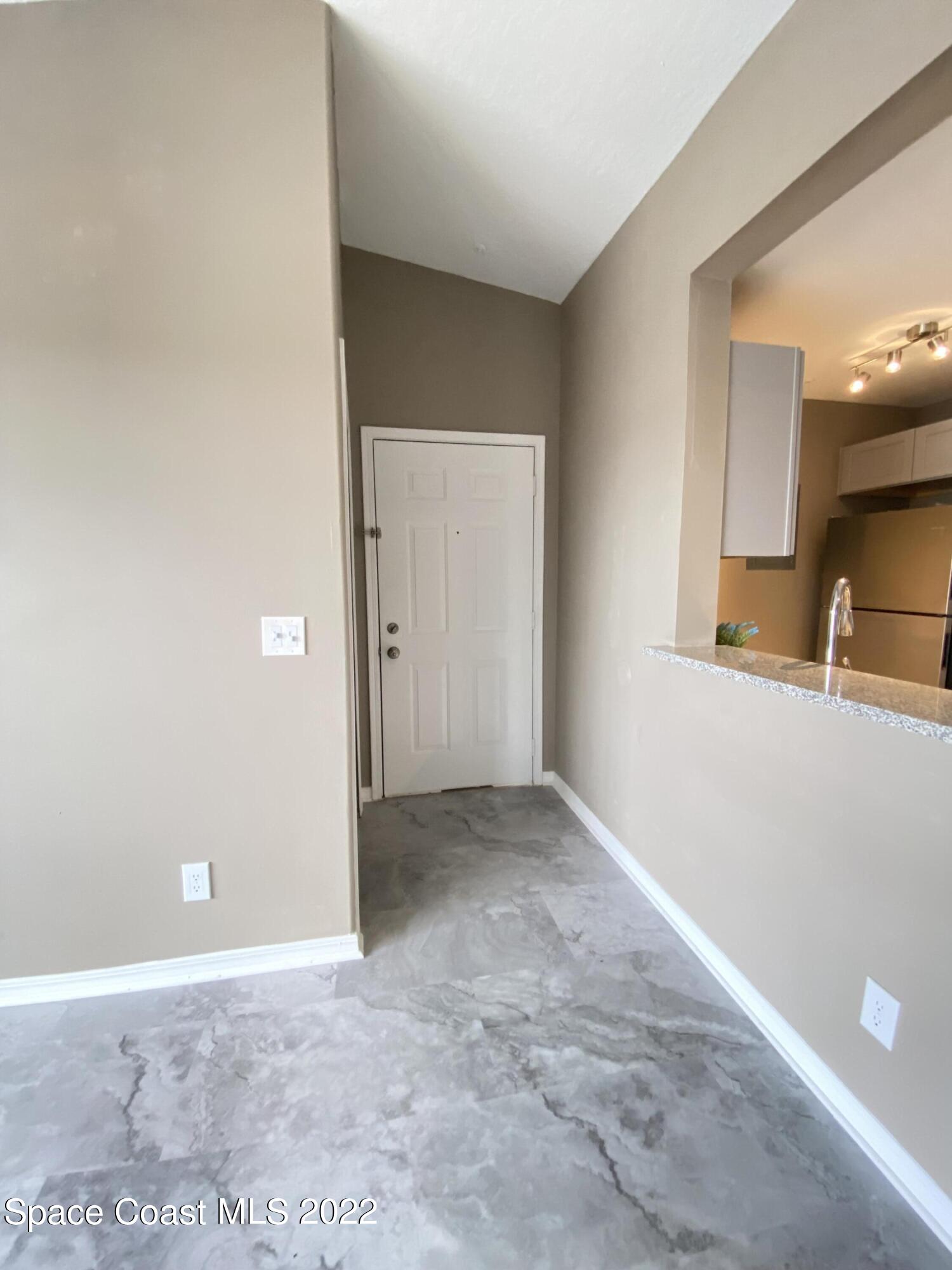 7667 North Wickham Road, Unit 418 Melbourne, FL 32940 - Photo 4 of 36