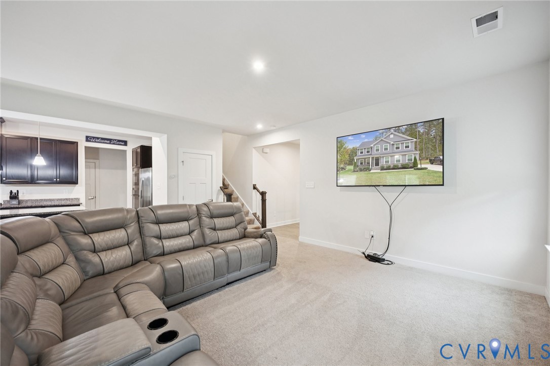 10237 Centralia Sta Road Chester, VA 23831 - Photo 13 of 35 a living room with furniture and a flat screen tv