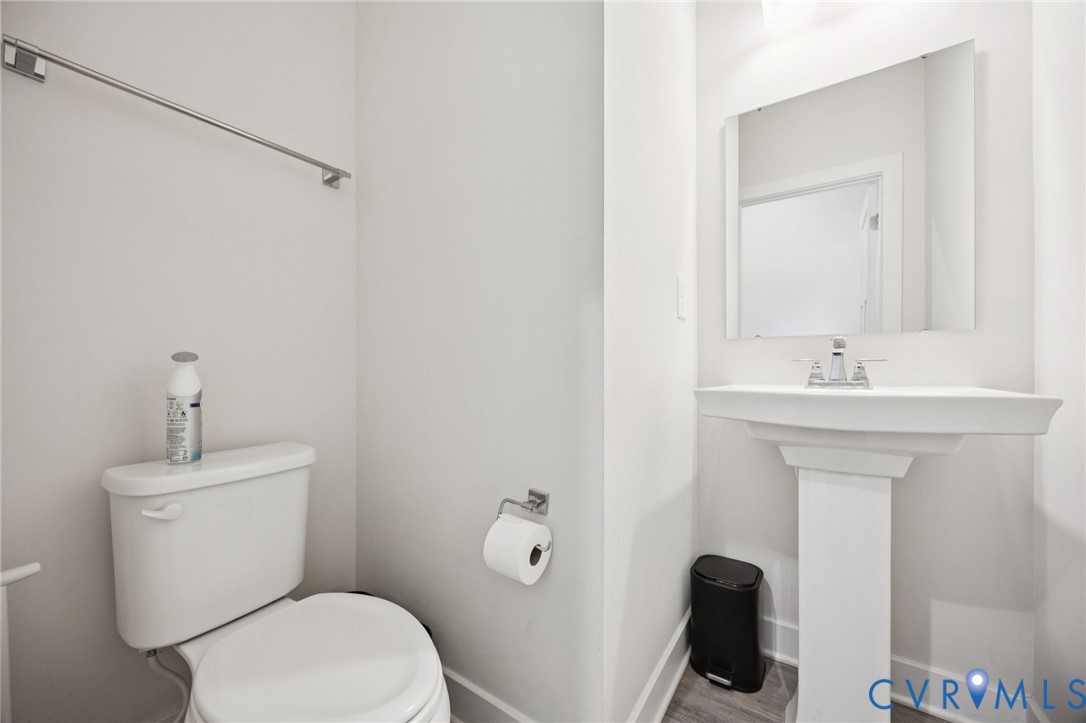 10237 Centralia Sta Road Chester, VA 23831 - Photo 15 of 35 a bathroom with a toilet sink and mirror