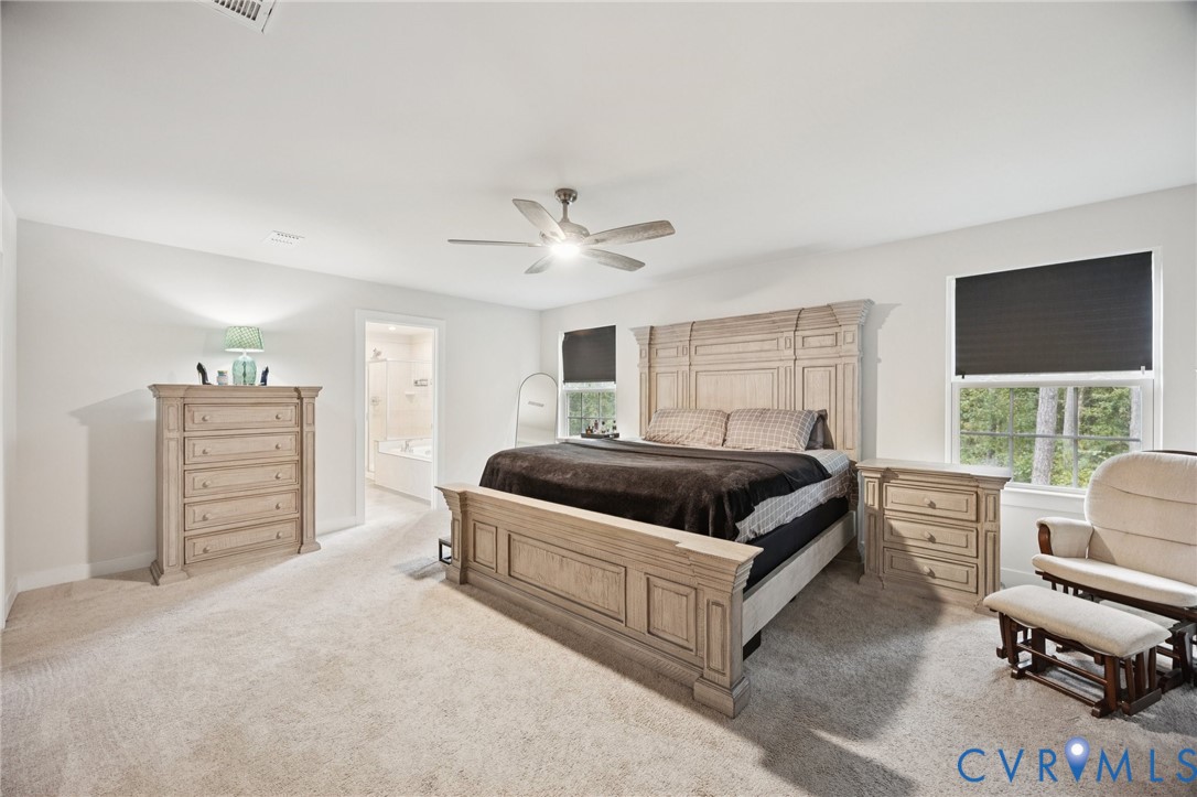 10237 Centralia Sta Road Chester, VA 23831 - Photo 16 of 35 a bedroom with a bed and a couch