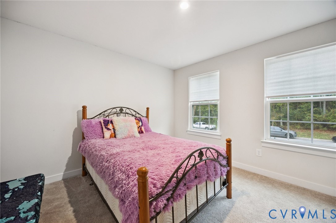 10237 Centralia Sta Road Chester, VA 23831 - Photo 23 of 35 a bedroom with a bed and a window