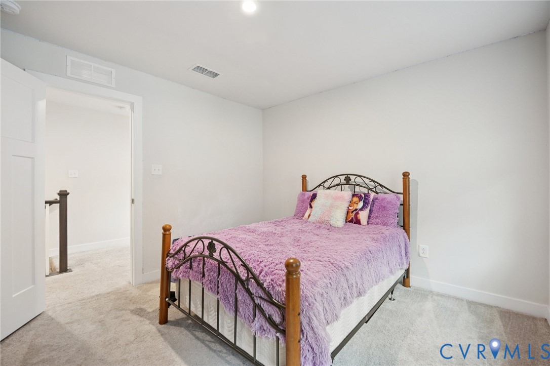 10237 Centralia Sta Road Chester, VA 23831 - Photo 24 of 35 a bedroom with a bed and a table