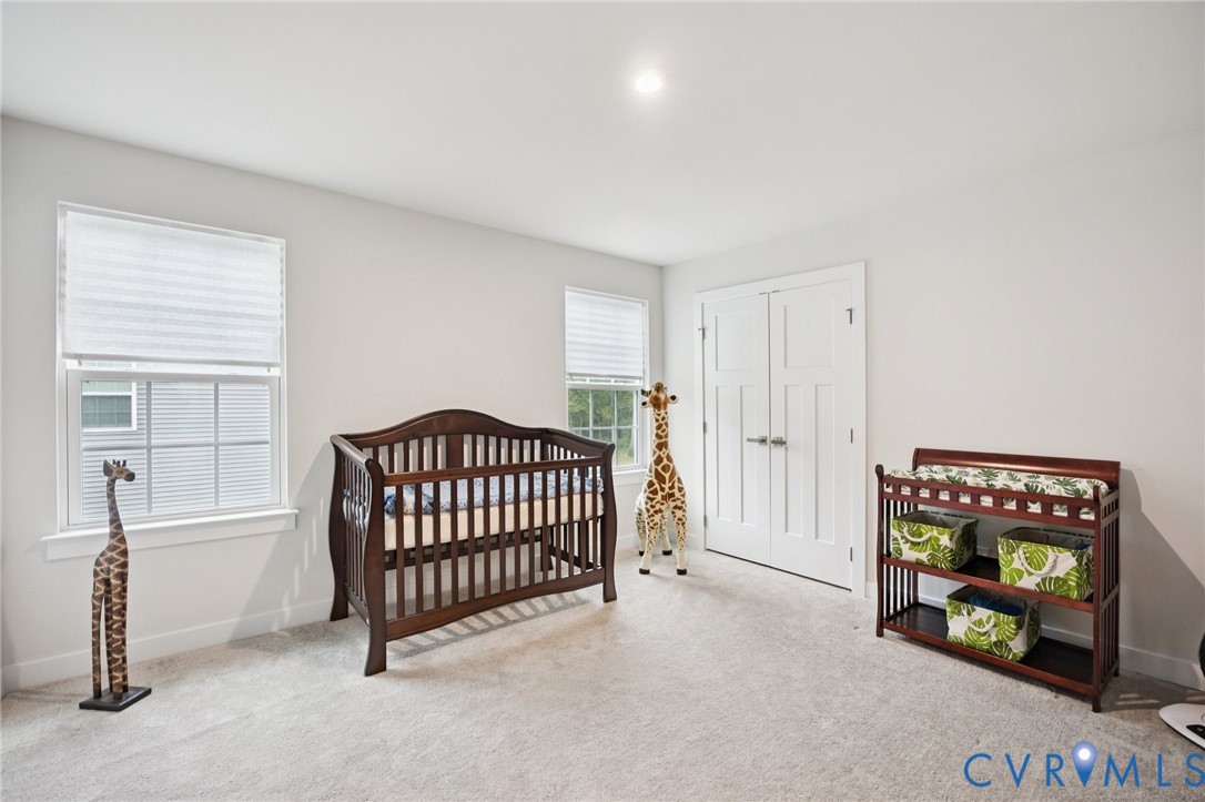 10237 Centralia Sta Road Chester, VA 23831 - Photo 27 of 35 a bedroom with a bed and a window