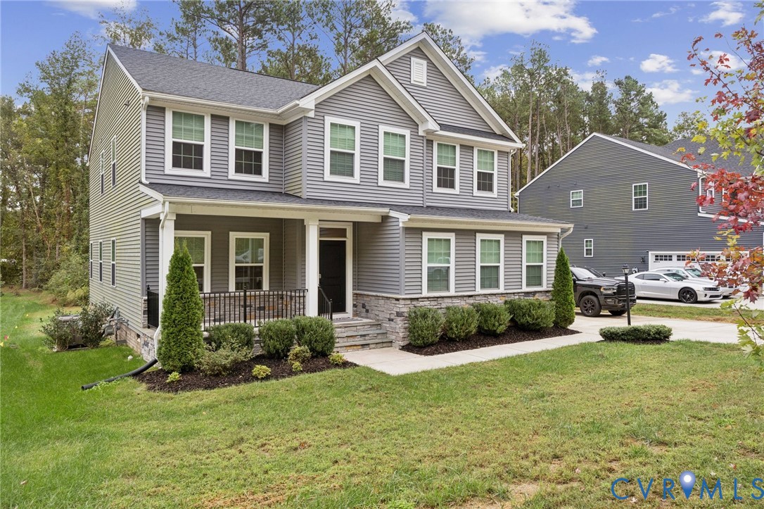 10237 Centralia Sta Road Chester, VA 23831 - Photo 32 of 35 a front view of a house with garden and porch