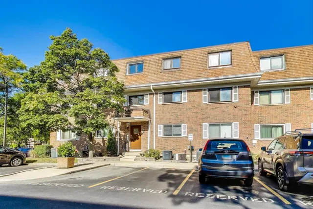 a car parked in front of a building