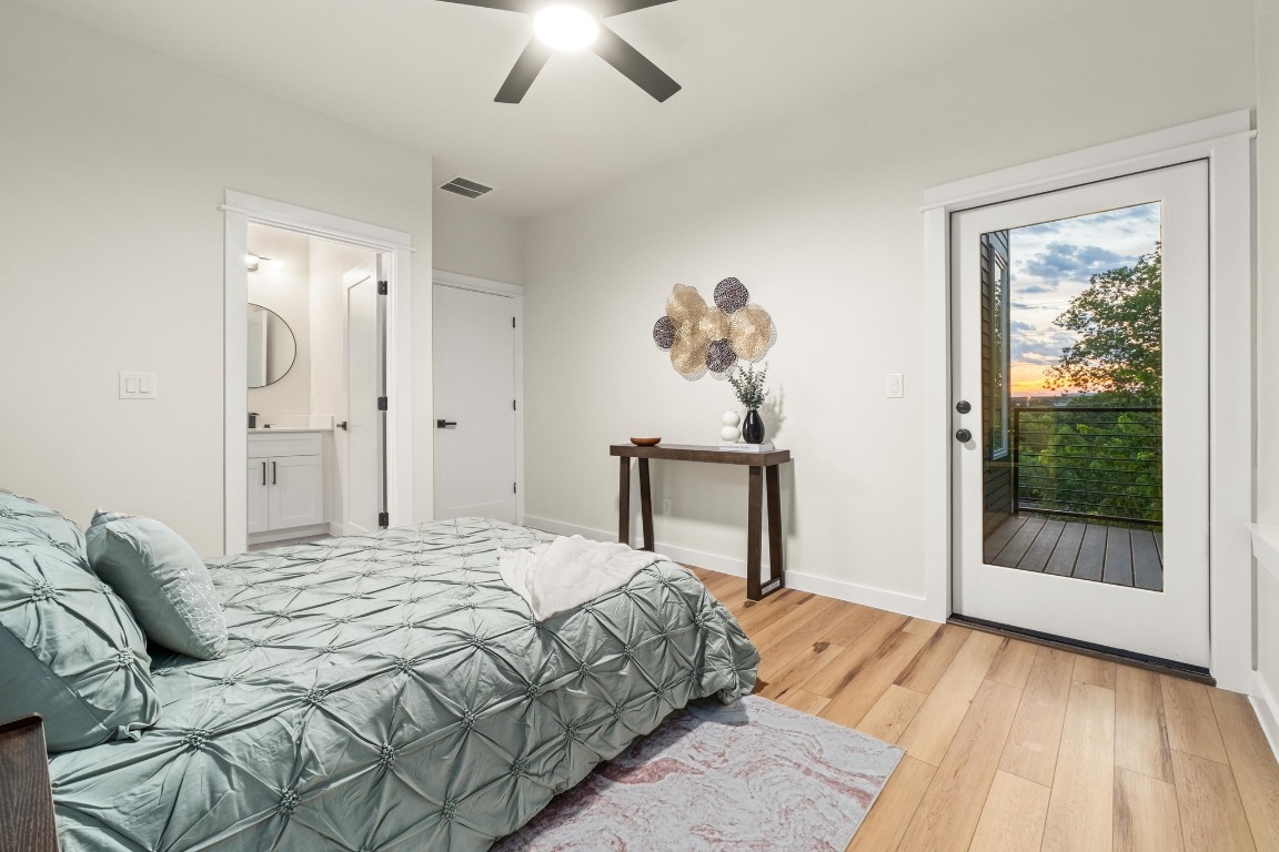 2309 Montopolis Drive, Unit 3 Austin, TX 78741 - Photo 11 of 35 a bedroom with a bed and a window