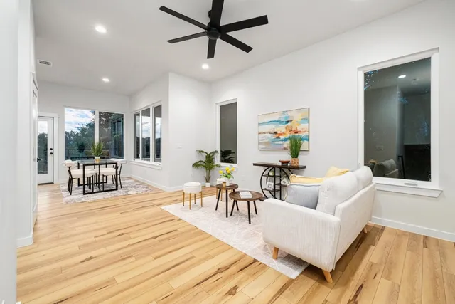 a living room with furniture and a table