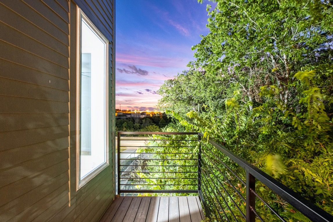2309 Montopolis Drive, Unit 3 Austin, TX 78741 - Photo 34 of 35 a view of balcony with wooden floor