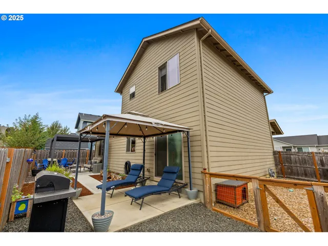 a front view of house with outdoor seating