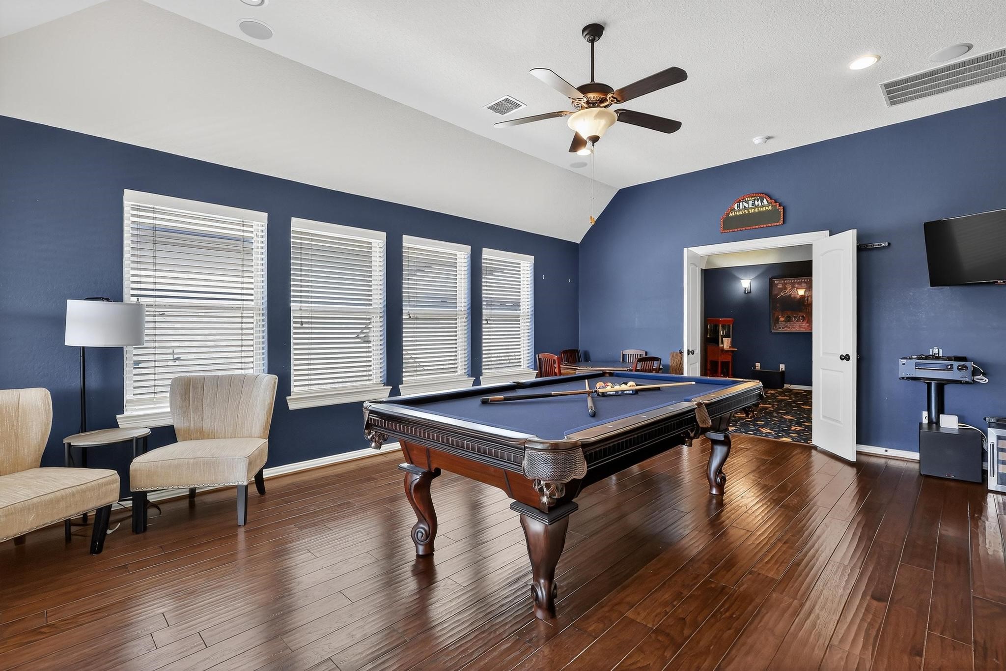 25803 Heritage Maple Drive Spring, TX 77389 - Photo 22 of 46 a room with furniture pool table flat screen tv and a large window