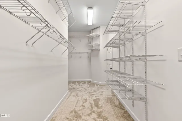 a bathroom with a granite countertop sink a toilet and a bathtub