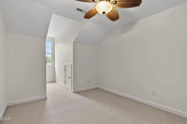 an aerial view of residential house with outdoor space and swimming pool