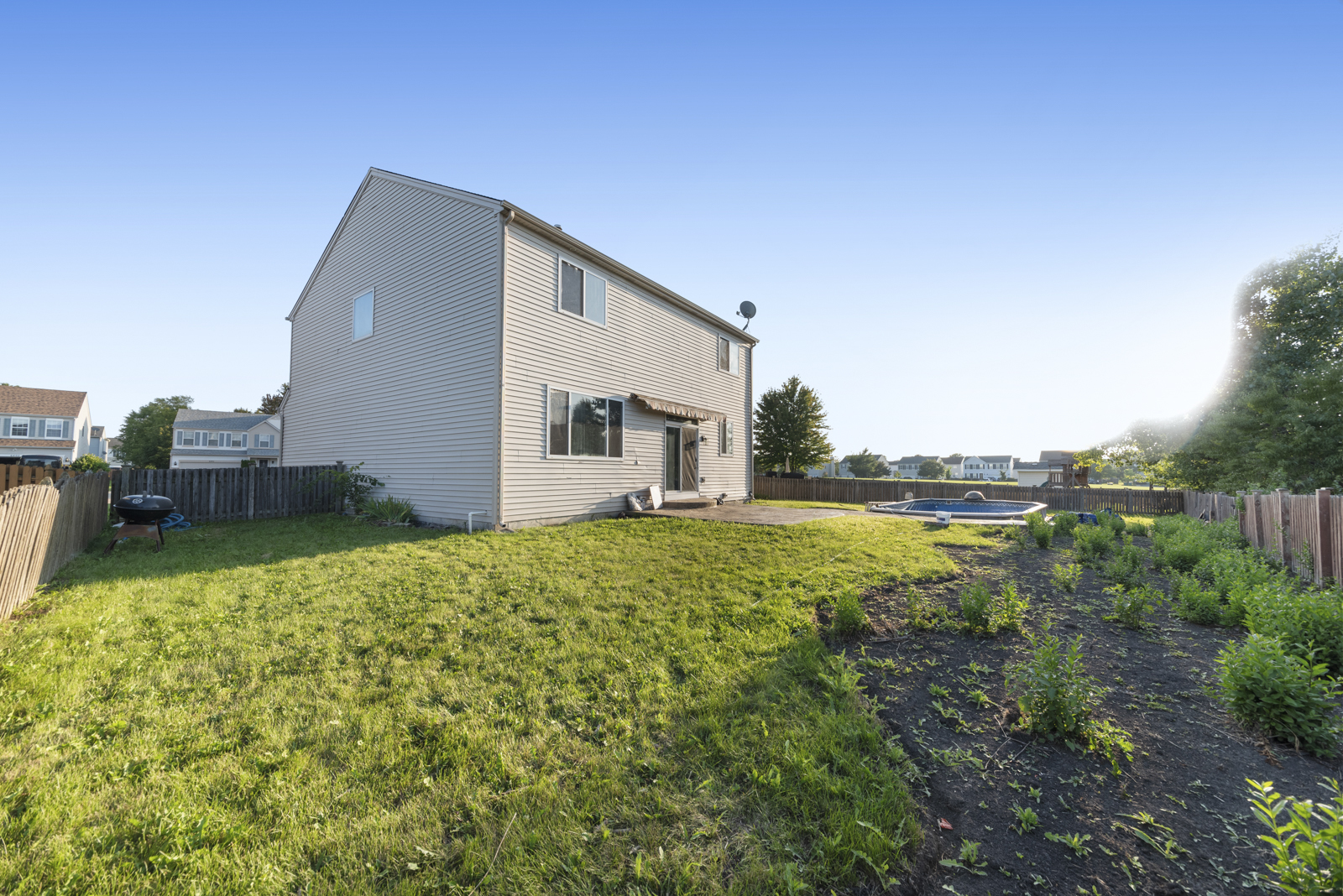 6407 Coyote Ridge Court Plainfield, IL 60586 - Photo 20 of 24 a view of a house with a backyard
