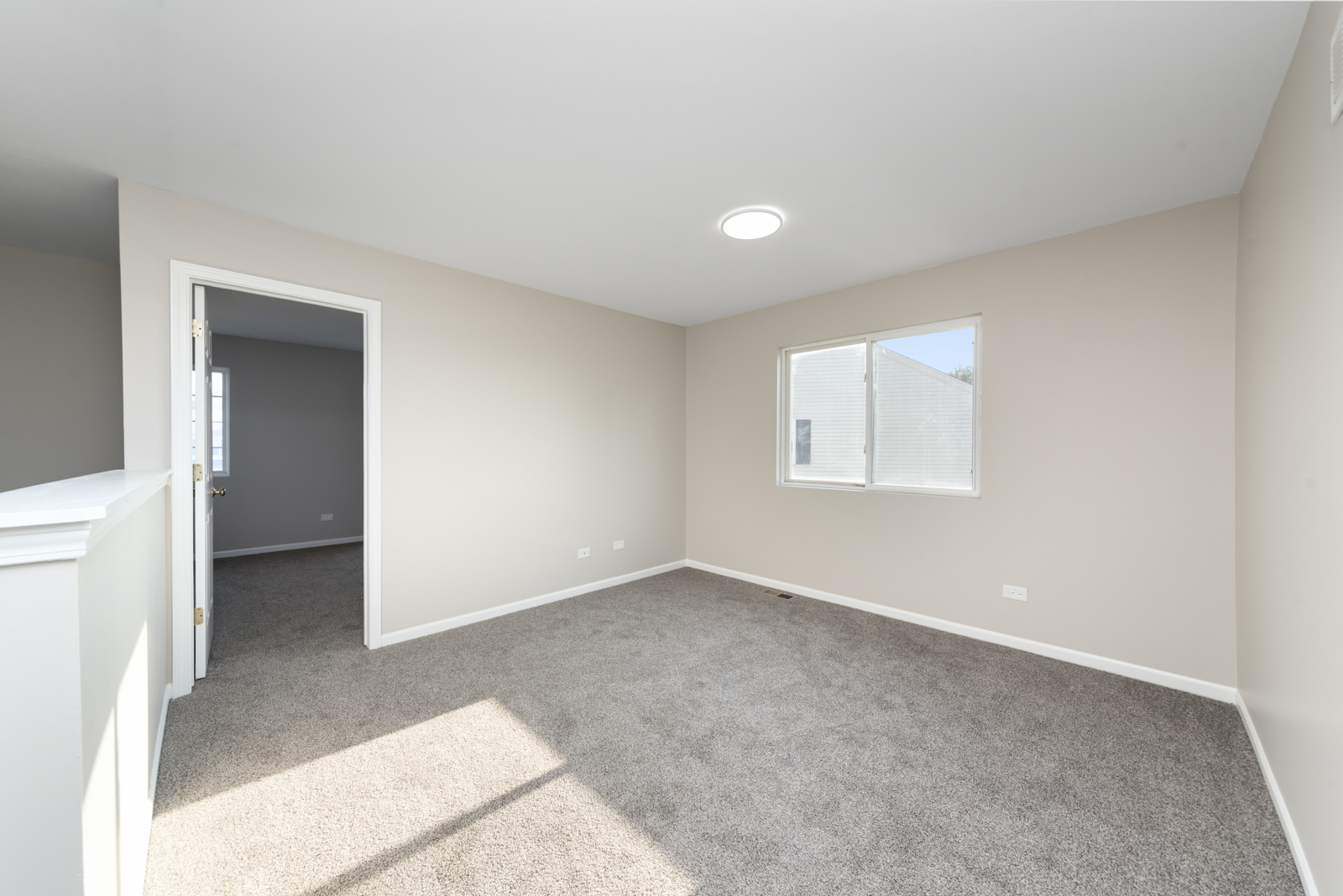 6407 Coyote Ridge Court Plainfield, IL 60586 - Photo 10 of 24 an empty room with a bathroom and a sink