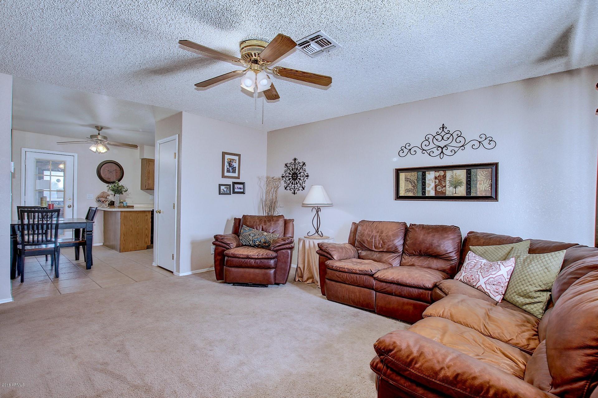 24460 South Sossaman Road Queen Creek, AZ 85142 - Photo 4 of 29 Living room reverse