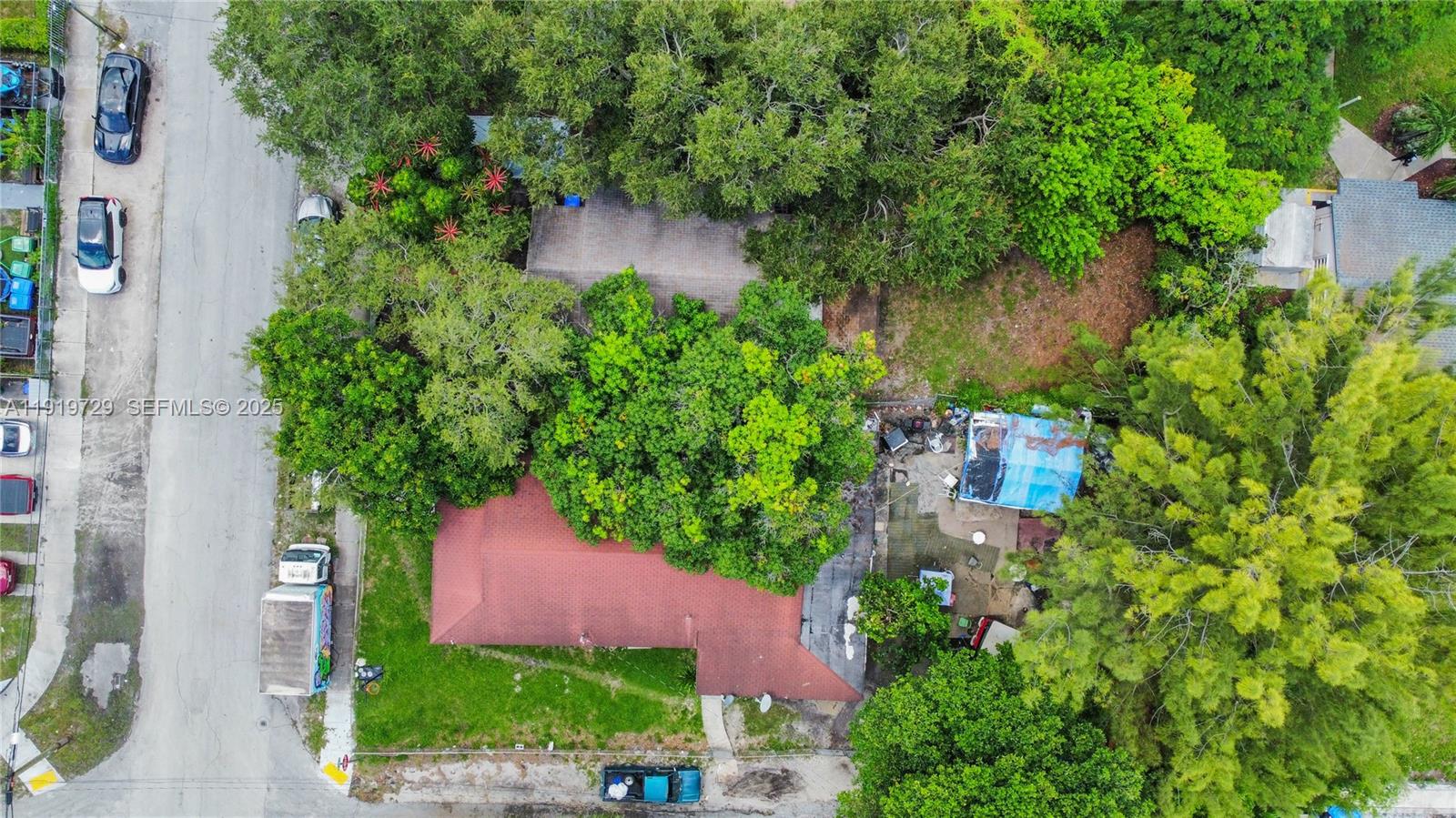 105 Northwest 58th Street Miami, FL 33127 - Photo 6 of 8 an aerial view of a house with pool outdoor seating and yard