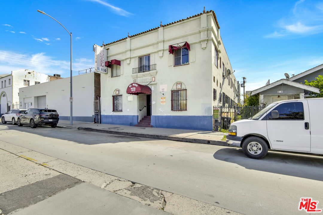 1042 Wilcox Avenue Los Angeles, CA 90038 - Photo 22 of 24 a car parked in front of a house