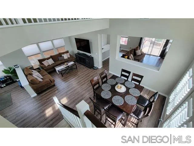 2476 Fallbrook Place Escondido, CA 92027 - Photo 11 of 33 a living room with furniture and a flat screen tv