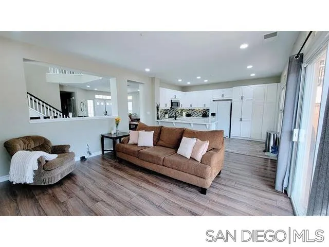 2476 Fallbrook Place Escondido, CA 92027 - Photo 13 of 33 a living room with furniture and a couch