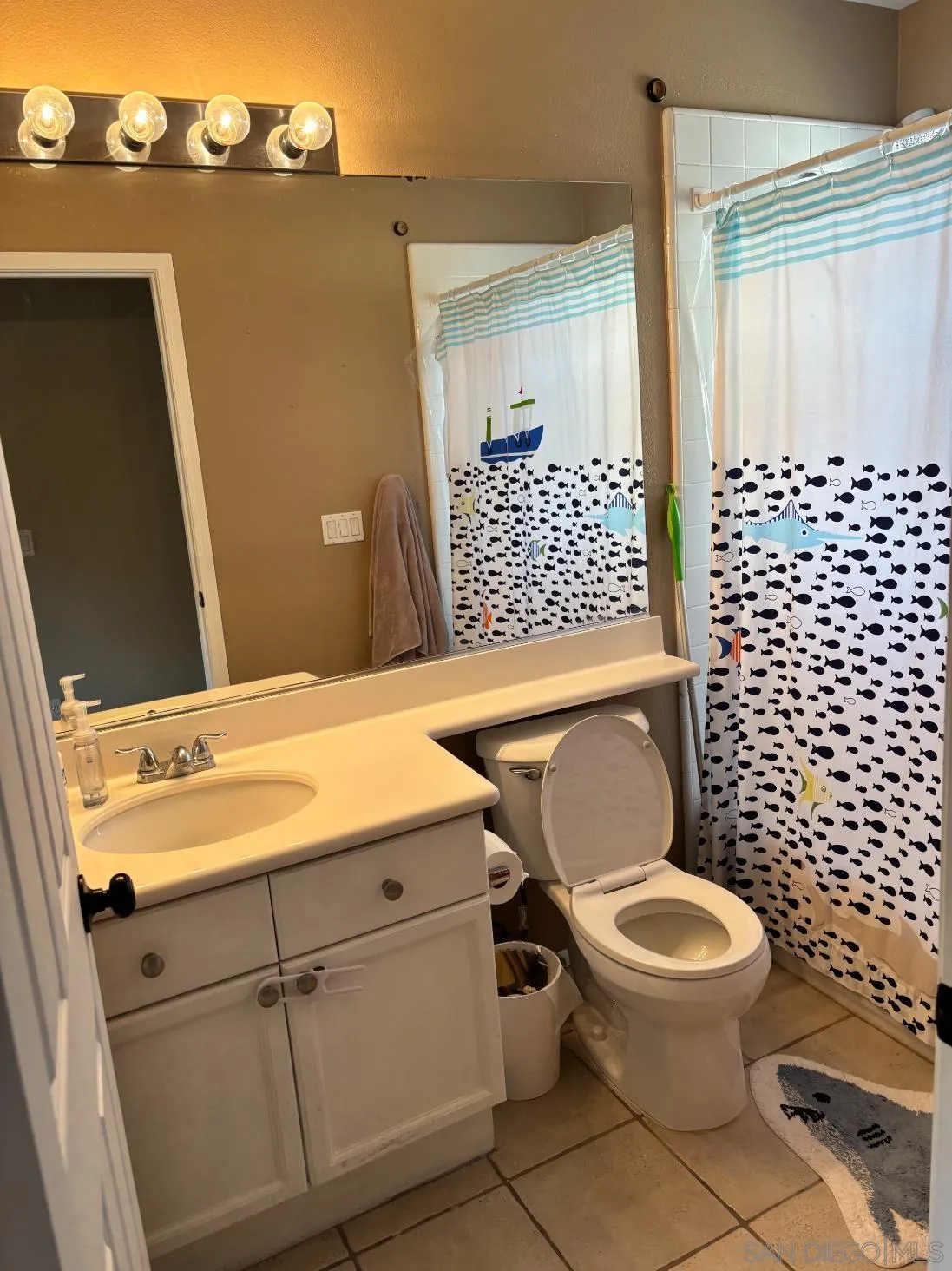2476 Fallbrook Place Escondido, CA 92027 - Photo 21 of 33 a bathroom with a toilet a sink and a shower