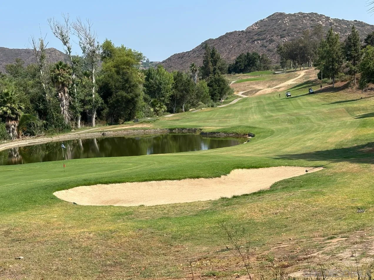 2476 Fallbrook Place Escondido, CA 92027 - Photo 28 of 33 a view of a lake with a yard
